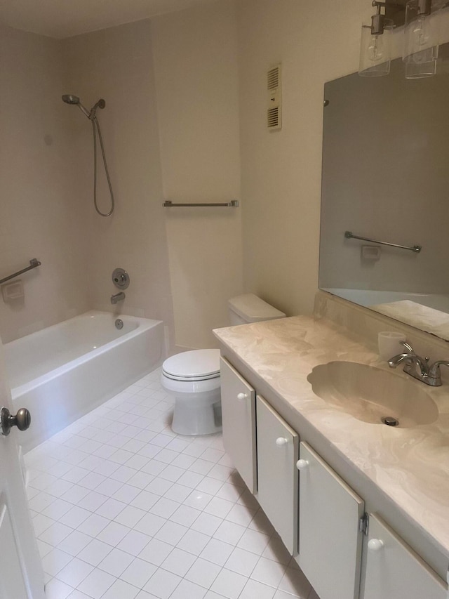 full bathroom featuring bathing tub / shower combination, tile patterned flooring, vanity, and toilet