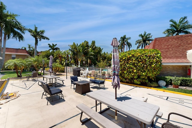 view of terrace featuring a fire pit