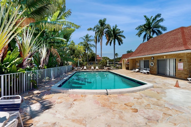 view of pool featuring a patio