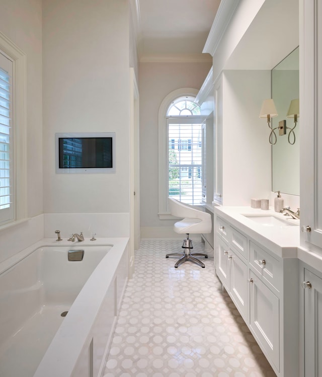 bathroom featuring a tub, tile flooring, vanity, and crown molding