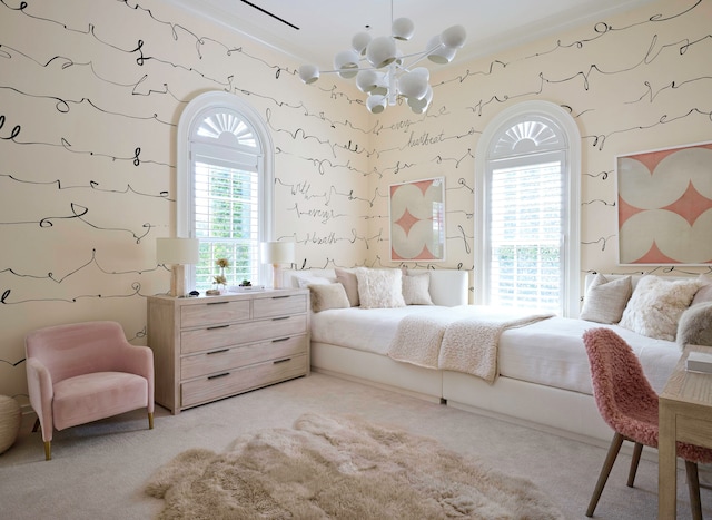 carpeted bedroom with multiple windows and an inviting chandelier