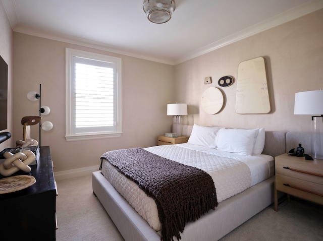 carpeted bedroom featuring crown molding