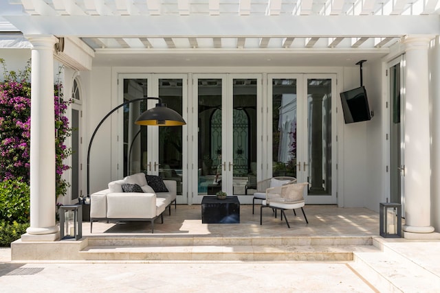 view of patio / terrace with a pergola and french doors