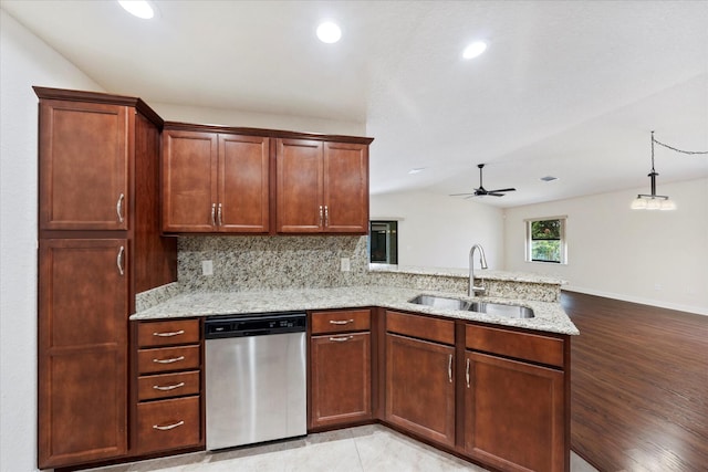 kitchen with ceiling fan, hardwood / wood-style floors, dishwasher, pendant lighting, and sink