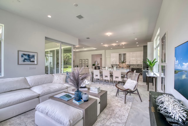 living room with light tile patterned floors