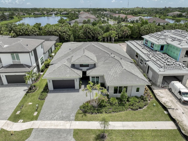 aerial view featuring a water view and a residential view