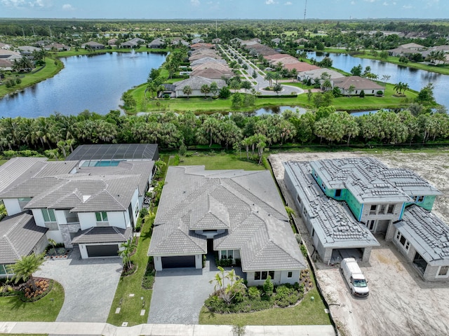 drone / aerial view with a water view