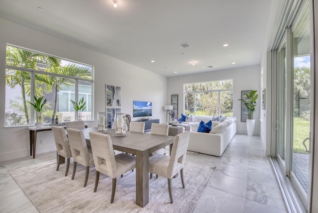 dining space featuring recessed lighting, visible vents, and baseboards