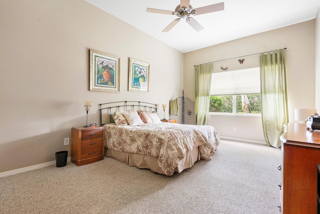 bedroom with ceiling fan and light carpet