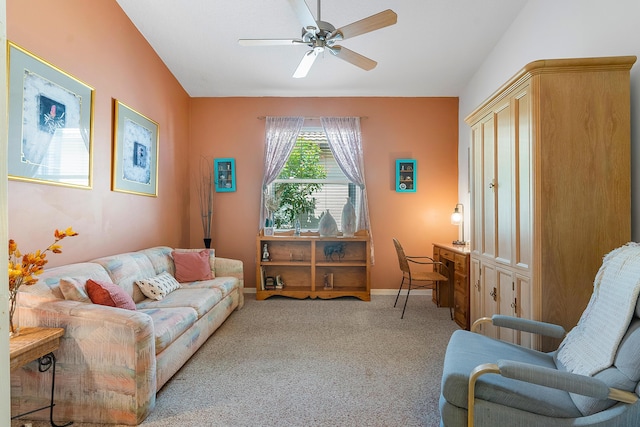 carpeted living room featuring ceiling fan