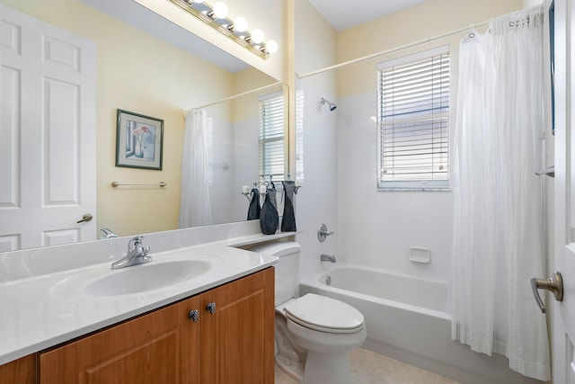 full bathroom with shower / bath combo, toilet, vanity with extensive cabinet space, and tile flooring