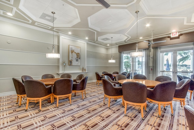 dining area with a wealth of natural light, ceiling fan, and a high ceiling