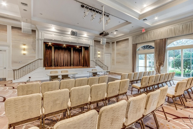 home theater room with beam ceiling, crown molding, and coffered ceiling