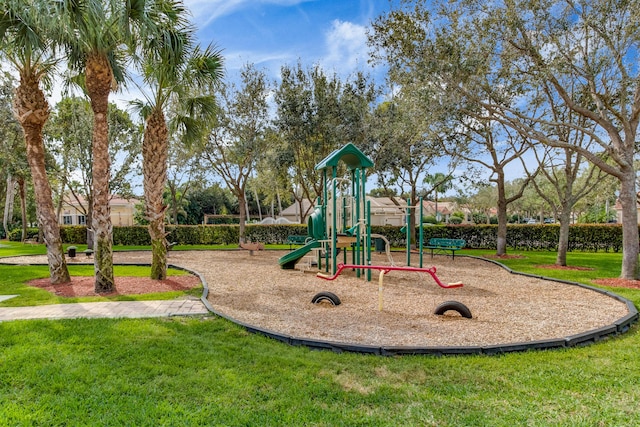 view of play area featuring a lawn