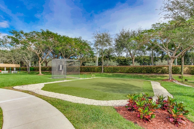 surrounding community featuring a lawn