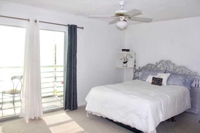 bedroom with access to exterior, carpet floors, multiple windows, and ceiling fan