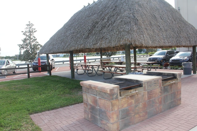 view of home's community featuring a gazebo and a lawn