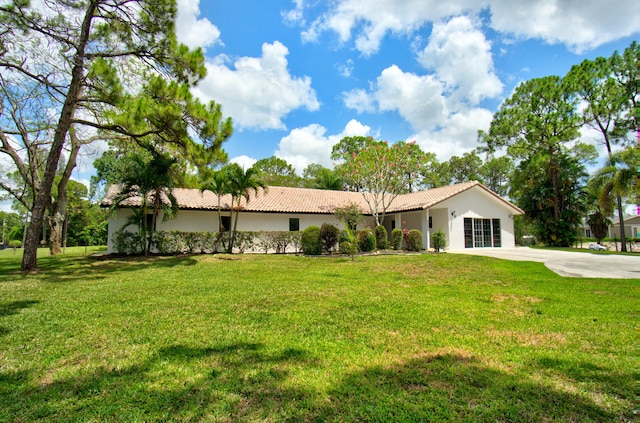 ranch-style house with a front yard