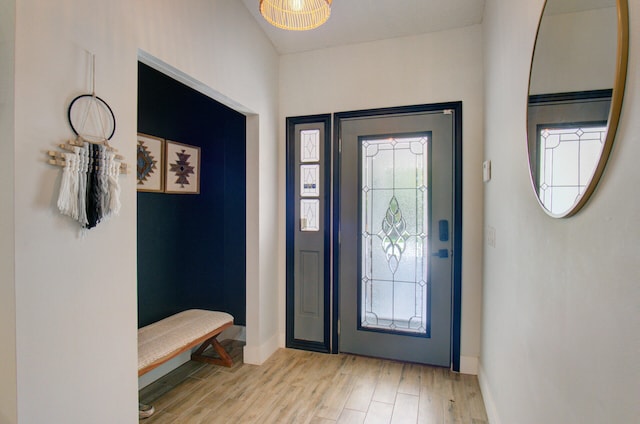 entrance foyer featuring light wood-type flooring and a wealth of natural light