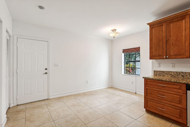 interior space featuring light tile patterned floors