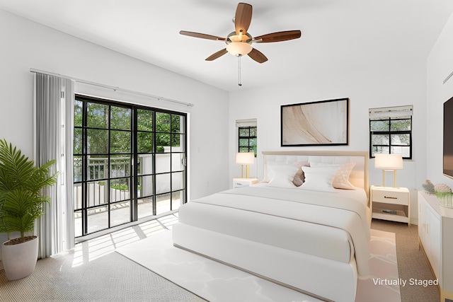 bedroom with ceiling fan, access to outside, and light carpet