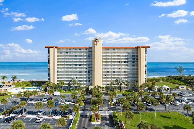 view of building exterior with a water view