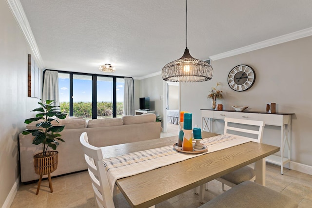 dining space featuring a textured ceiling and crown molding