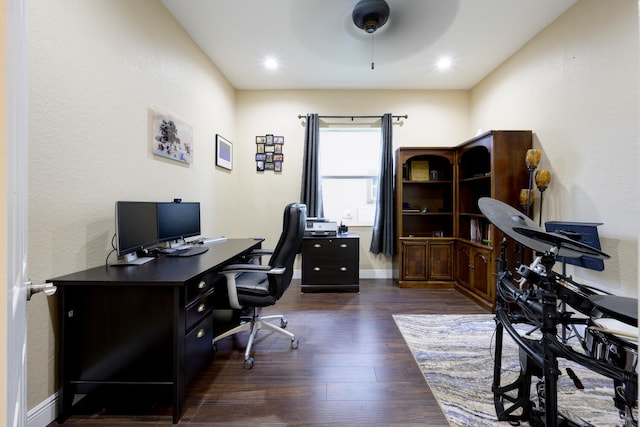 office space featuring dark wood-type flooring and ceiling fan