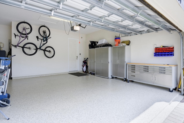 garage featuring a garage door opener