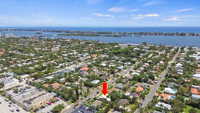 birds eye view of property featuring a water view