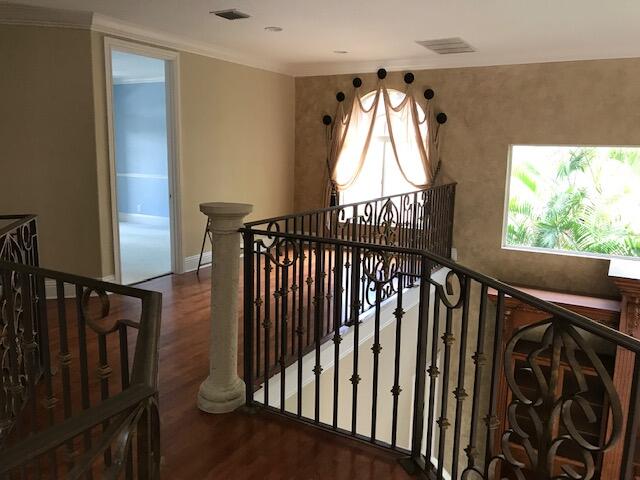 stairway with wood-type flooring