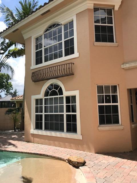 rear view of house with a patio