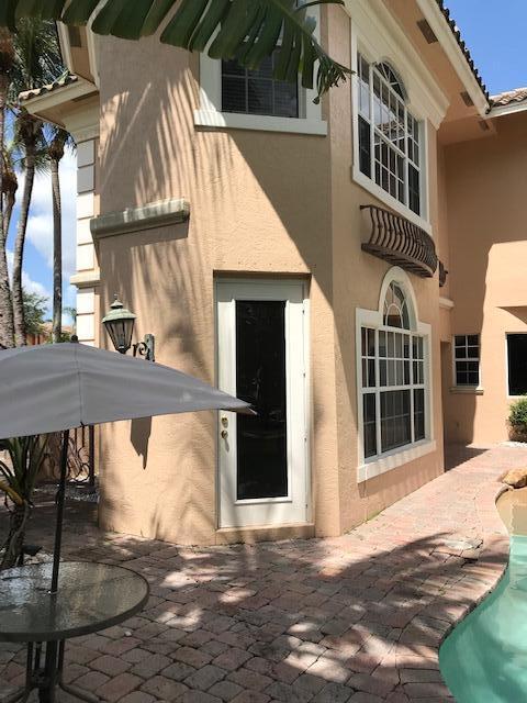 rear view of house featuring a patio