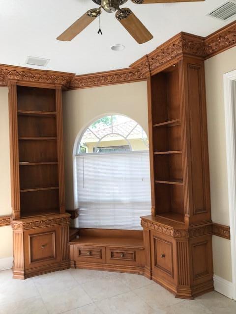 mudroom featuring ceiling fan and light tile floors