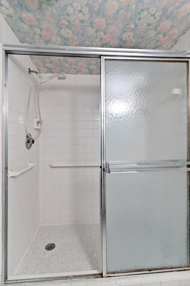 bathroom featuring an enclosed shower