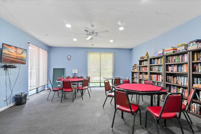 dining room with a ceiling fan, recessed lighting, and a textured ceiling