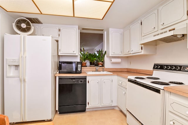 kitchen featuring light countertops, under cabinet range hood, black appliances, and white cabinetry