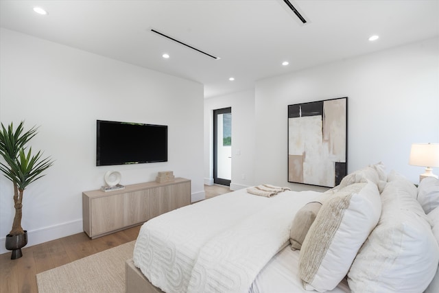 bedroom with light wood-type flooring