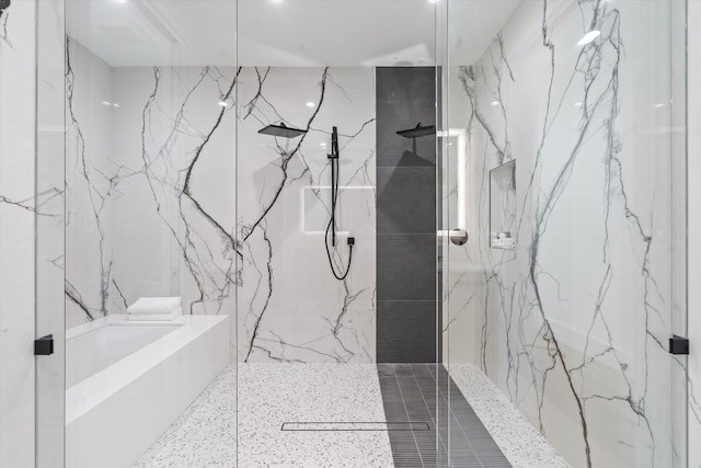 bathroom featuring tiled shower