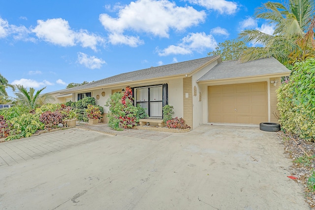 ranch-style house with a garage