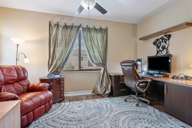 office space featuring hardwood / wood-style floors and ceiling fan