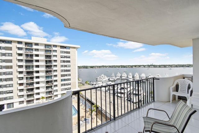 balcony featuring a water view