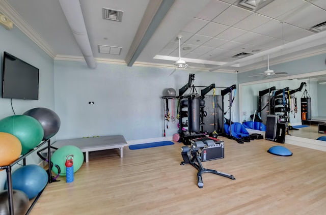 workout room featuring wood-type flooring and ceiling fan