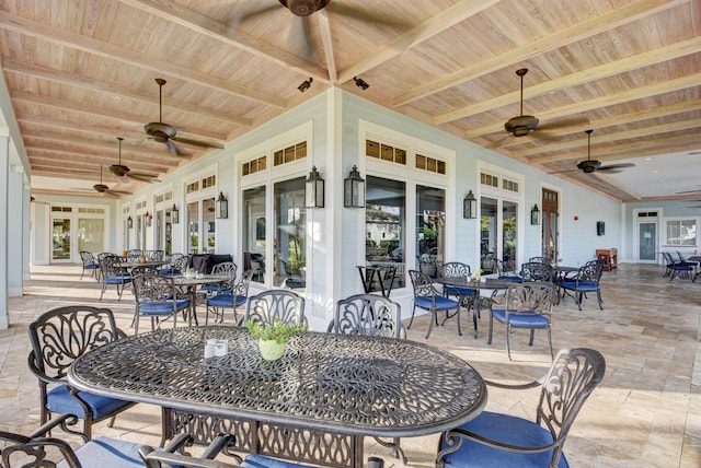 view of patio featuring french doors and ceiling fan