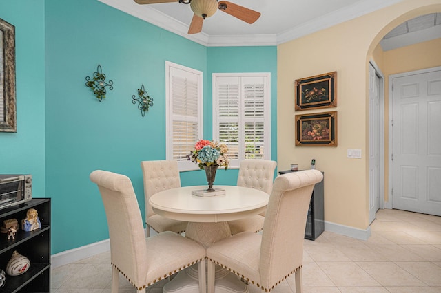 bedroom featuring hardwood / wood-style flooring, ceiling fan, and ornamental molding