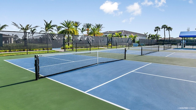 view of sport court featuring basketball hoop