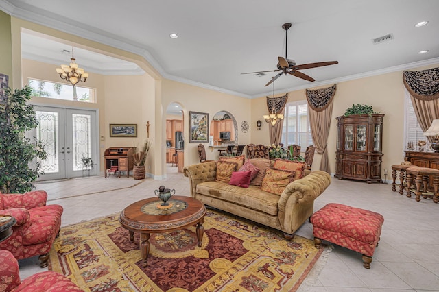 dining area featuring crown molding, light tile patterned floors, and an inviting chandelier