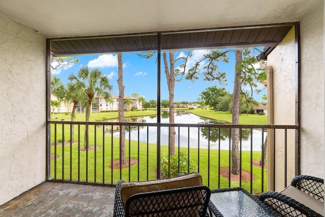 sunroom with a water view