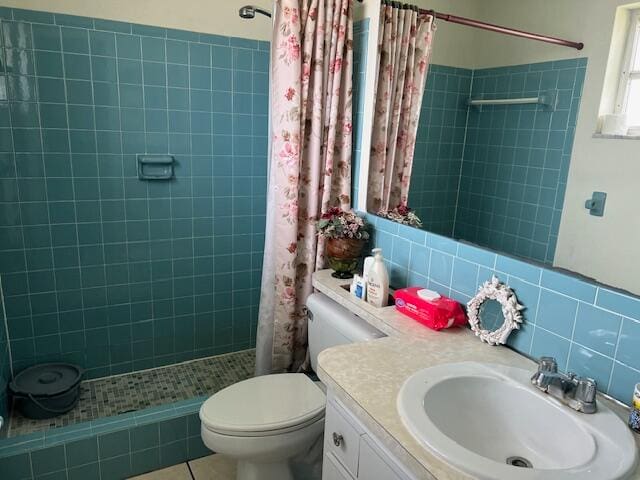 bathroom with tile walls, a shower with shower curtain, tasteful backsplash, and toilet