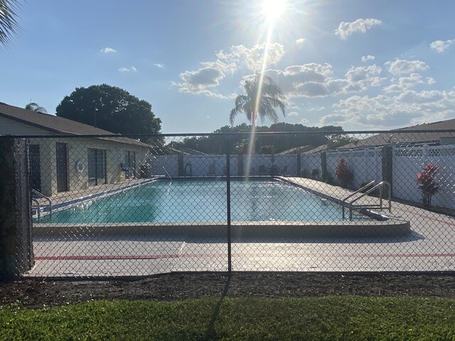 view of pool featuring a patio